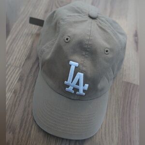 Genuine Merchandise Tan Cap with White Logo LA
